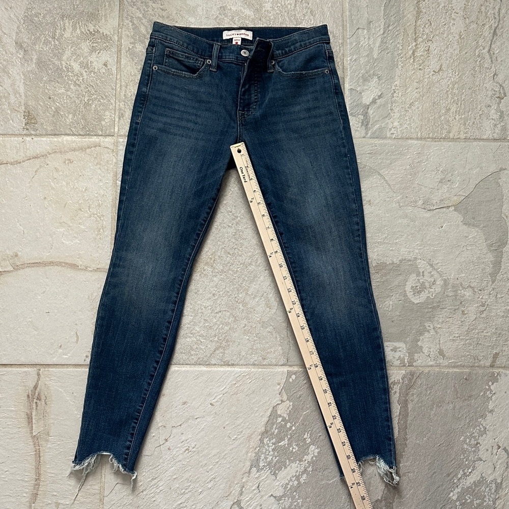 Lucky Brand/ size 4/ mid rise skinny, raw ankle hem
